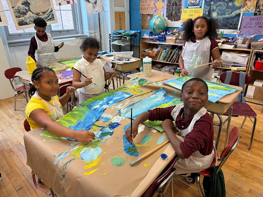 Students painting in after school art class